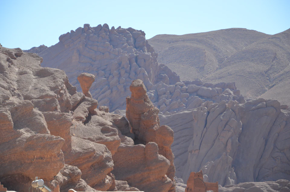 Eroded rock formations in a High Atlas gorge, the terrain that mountain roads cross and that winter weather can affect