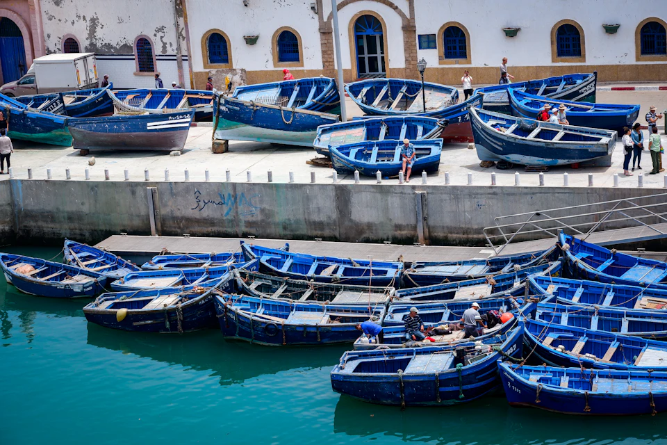 Blue fishing boats moored in Essaouira harbour, the Atlantic port 190 km west of Marrakech.