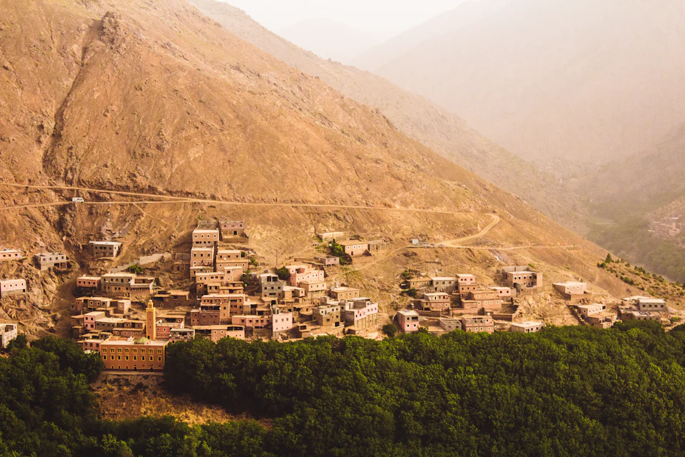 Berber village built on a hillside near Imlil in the High Atlas, the kind of view you reach on a day trip from Marrakech