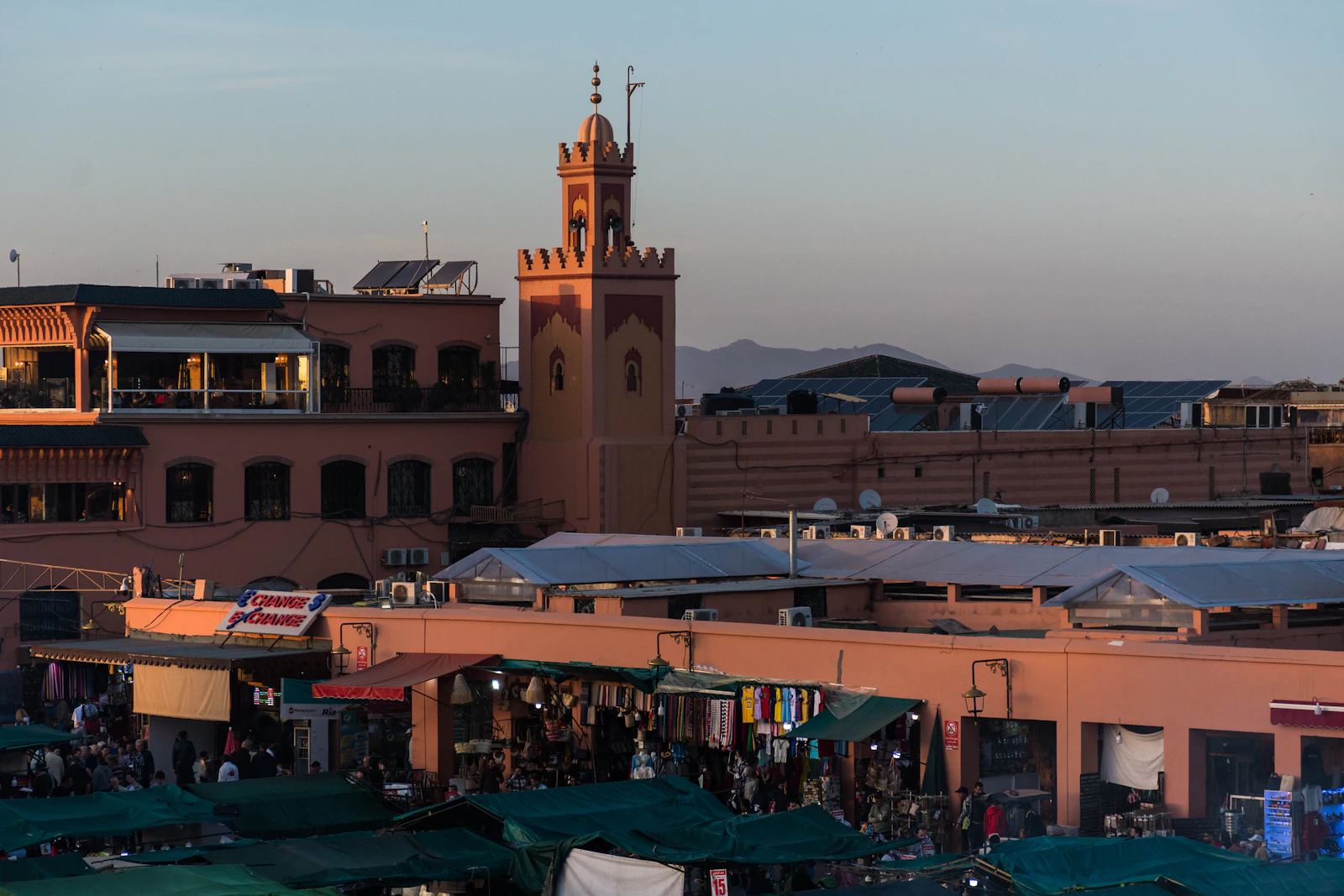 Jemaa el-Fna square and the Koutoubia mosque in Marrakech at dusk
