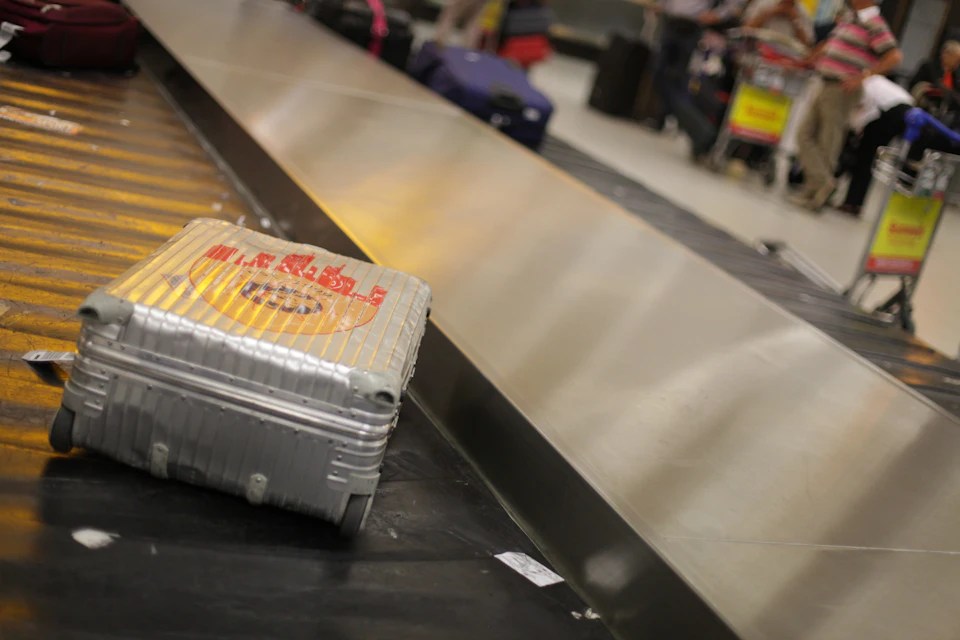 Suitcases on an airport baggage belt, the first stop after landing at any of Morocco's international airports