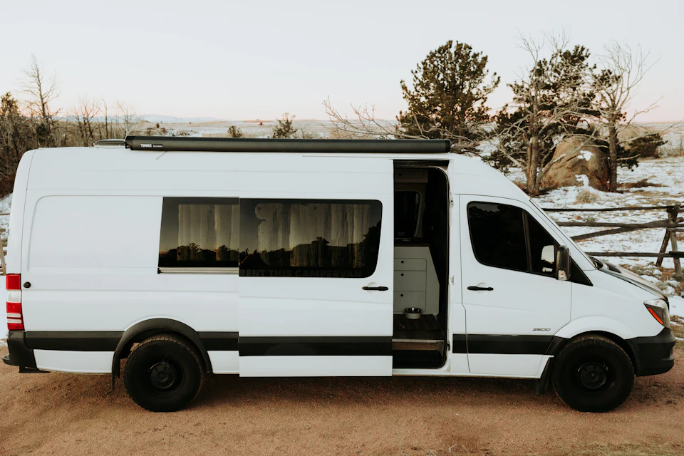 White Mercedes Sprinter minibus for group transfers