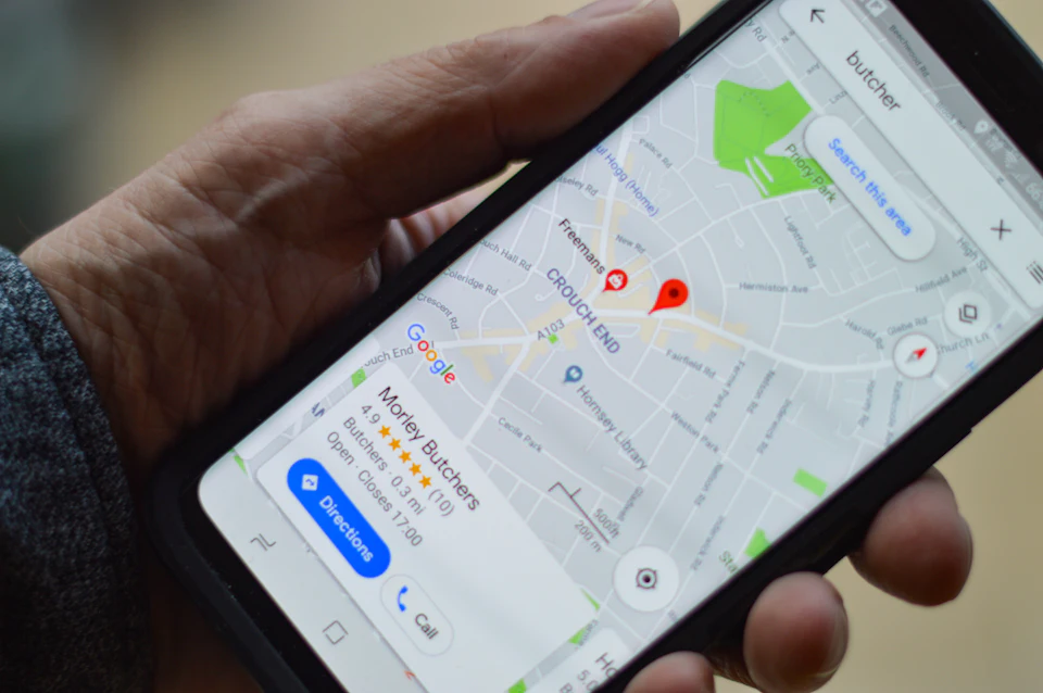 Hand holding a smartphone showing a map, the first thing travellers need mobile data for on arrival in Morocco.