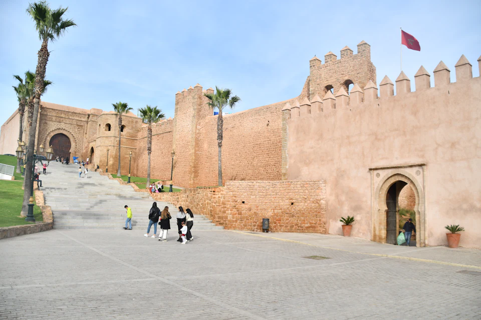 Ochre walls of the Kasbah of the Udayas in Rabat, the capital reached from Marrakech by train or motorway